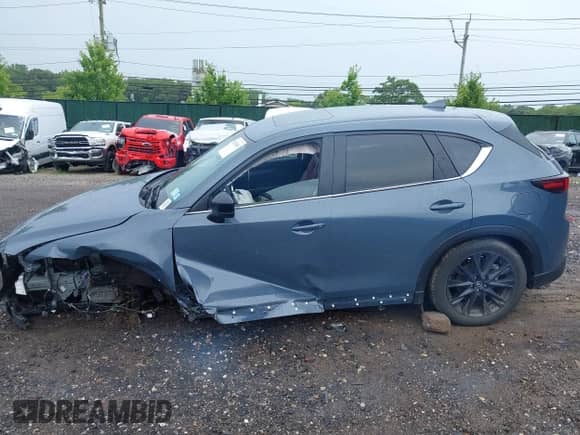 2023 Mazda CX-5 S Preferred z VIN JM3KFBCM8P0281595, wystawiony jako IAAI lot #42633863 z przebiegiem 26 513 mil mil oraz . Historia ofert i sprzedaży dostępna na DreamBid. Obrazek 13.