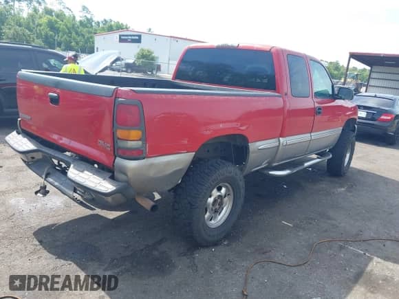 2001 GMC Sierra 1500 SLE z VIN 2GTEC19T811333343, wystawiony jako IAAI lot #42364413 z przebiegiem 374 221 mil mil oraz . Historia ofert i sprzedaży dostępna na DreamBid. Obrazek 4.