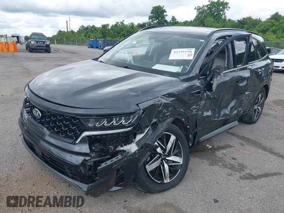 2021 Kia Sorento EX with VIN 5XYRH4LF4MG032974, listed as a IAAI auction lot 42235158 with 74,850 mi miles and . Bid and sale history available at DreamBid. Image 2.