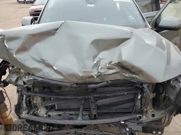 2023 Chevrolet Suburban LT with VIN 1GNSKCKD2PR164058, listed as a Copart auction lot 70387065 with 58,551 mi miles and Salvage title. Bid and sale history available at DreamBid. Image 12.