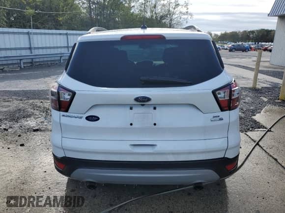 2018 Ford Escape SE с VIN 1FMCU9GDXJUC76965, выставлен на аукционе Copart как лот 85739575 с пробегом 73 835 миль миль и Чистый • Clean title. История ставок и продаж доступна на DreamBid. Изображение 6.