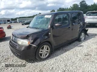 2012 Nissan Cube SL с VIN JN8AZ2KR7CT250473, выставлен на аукционе Copart как лот 61201095 с пробегом Не указан миль и Списание • Salvage title. История ставок и продаж доступна на DreamBid. Изображение 1.