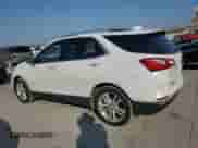 2018 Chevrolet Equinox Premier with VIN 2GNAXMEV7J6214978, listed as a Copart auction lot 69108875 with 63,716 mi miles and Salvage title. Bid and sale history available at DreamBid. Image 2.