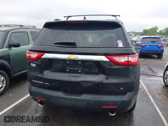2019 Chevrolet Traverse LT Cloth z VIN 1GNEVGKW4KJ177866, wystawiony jako IAAI lot #42220370 z przebiegiem 101 731 mil mil oraz . Historia ofert i sprzedaży dostępna na DreamBid. Obrazek 16.