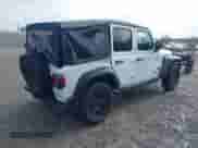 2023 Jeep Wrangler Sport S with VIN 1C4HJXDN9PW530537, listed as a IAAI auction lot 42713834 with 11,280 mi miles and . Bid and sale history available at DreamBid. Image 4.