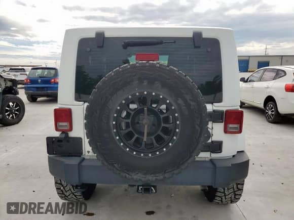 2013 Jeep Wrangler Rubicon 10th Anniversary with VIN 1C4BJWCGXDL550313, listed as a Copart auction lot 60374715 with 122,936 mi miles and Clean title. Bid and sale history available at DreamBid. Image 6.