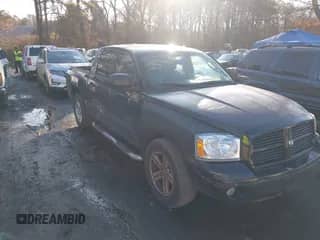 2007 Dodge Dakota SLT with VIN 1D7HW48N47S269812, listed as a IAAI auction lot 41496814 with 160,807 mi miles and . Bid and sale history available at DreamBid. Image 1.