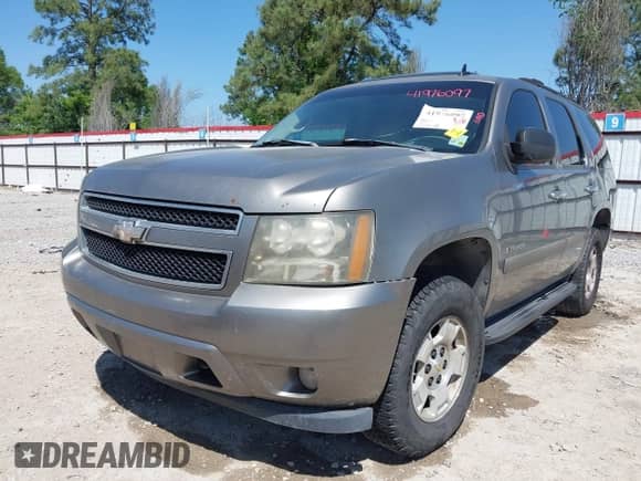 2007 Chevrolet Tahoe LT with VIN 1GNFC13097R155713, listed as a IAAI auction lot 41976097 with 269,278 mi miles and . Bid and sale history available at DreamBid. Image 6.