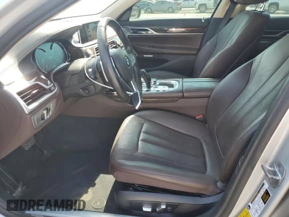 2018 BMW 7 Series 740e xDrive with VIN WBA7J2C51JG938447, listed as a Copart auction lot 63021064 with 81,105 mi miles and Salvage title. Bid and sale history available at DreamBid. Image 7.