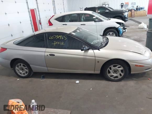 2001 Saturn SC с VIN 1G8ZP12841Z300417, выставлен на аукционе IAAI как лот 42731965 с пробегом 151 041 миль миль и . История ставок и продаж доступна на DreamBid. Изображение 13.