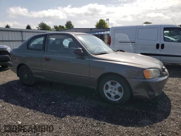 2001 Hyundai Accent GS с VIN KMHCG35C91U131429, выставлен на аукционе Copart как лот 65850374 с пробегом 46 282 миль миль и Чистый • Clean title. История ставок и продаж доступна на DreamBid. Изображение 4.