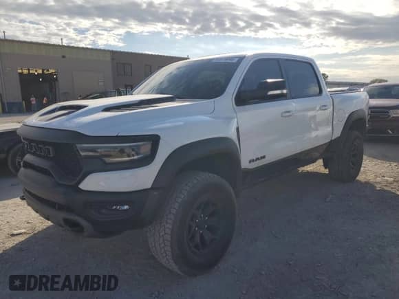 2022 Ram 1500 TRX с VIN 1C6SRFU91NN252416, выставлен на аукционе Copart как лот 85870095 с пробегом 64 500 миль миль и Списание • Salvage title. История ставок и продаж доступна на DreamBid. Изображение 1.