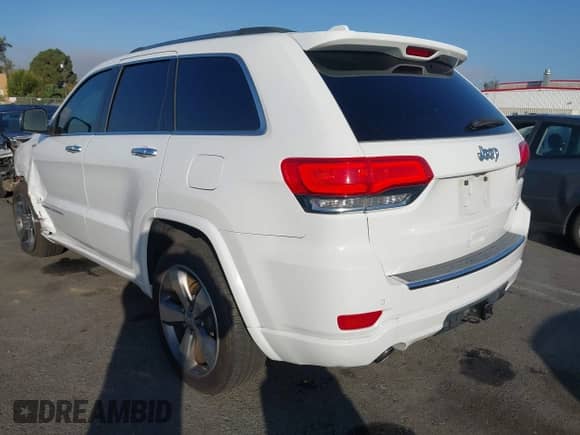 2015 Jeep Grand Cherokee Overland z VIN 1C4RJECG6FC848840, wystawiony jako IAAI lot #43513815 z przebiegiem 92 993 mil mil oraz . Historia ofert i sprzedaży dostępna na DreamBid. Obrazek 3.