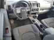 2005 Nissan Frontier XE with VIN 1N6BD06T75C440346, listed as a Copart auction lot 65784415 with 144,437 mi miles and Salvage title. Bid and sale history available at DreamBid. Image 8.