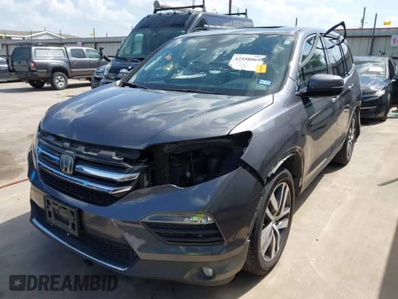 2018 Honda Pilot Touring с VIN 5FNYF5H96JB023495, выставлен на аукционе IAAI как лот 42558069 с пробегом 101 531 миль миль и . История ставок и продаж доступна на DreamBid. Изображение 2.