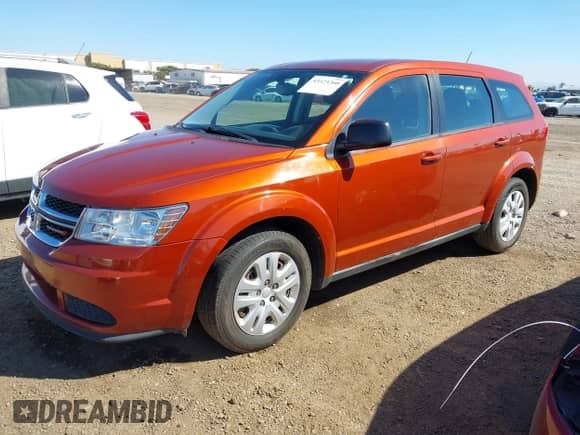 2014 Dodge Journey SE z VIN 3C4PDCAB2ET256638, wystawiony jako IAAI lot #43323260 z przebiegiem 84 994 mil mil oraz . Historia ofert i sprzedaży dostępna na DreamBid. Obrazek 2.