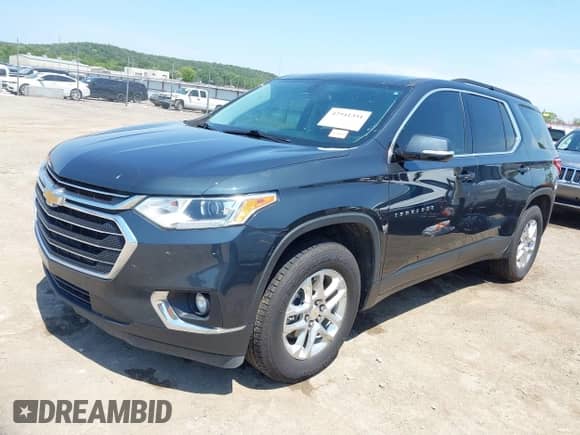 2020 Chevrolet Traverse LT Cloth z VIN 1GNERGKW9LJ315844, wystawiony jako IAAI lot #42941351 z przebiegiem 97 799 mil mil oraz . Historia ofert i sprzedaży dostępna na DreamBid. Obrazek 2.