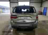 2014 Dodge Durango SXT with VIN 1C4RDJAG1EC381490, listed as a Copart auction lot 87370085 with 128,870 mi miles and Salvage title. Bid and sale history available at DreamBid. Image 6.