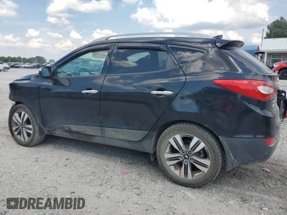 2015 Hyundai Tucson SE with VIN KM8JUCAG4FU016608, listed as a Copart auction lot 69098565 with 83,985 mi miles and Salvage title. Bid and sale history available at DreamBid. Image 2.