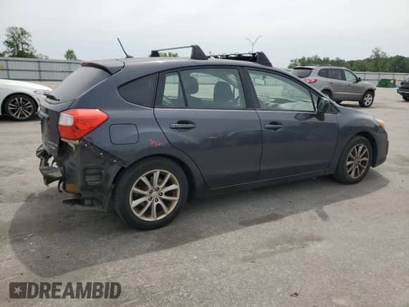 2012 Subaru Impreza Premium with VIN JF1GPAC66CG219434, listed as a Copart auction lot 54122935 with 144,060 mi miles and Salvage title. Bid and sale history available at DreamBid. Image 3.