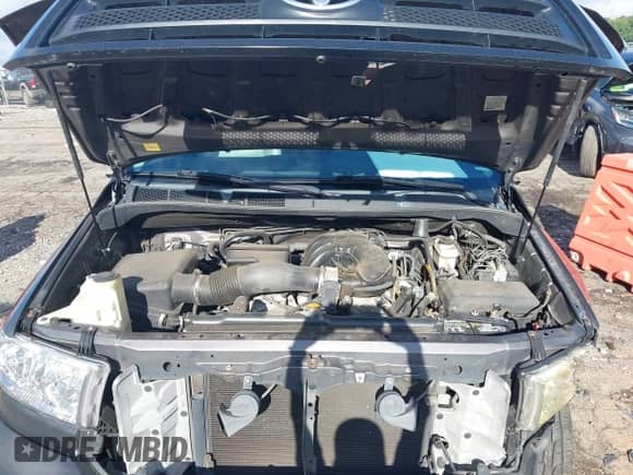 2012 Toyota Tundra z VIN 5TFRU5F14CX026640, wystawiony jako IAAI lot #42994627 z przebiegiem 310 619 mil mil oraz . Historia ofert i sprzedaży dostępna na DreamBid. Obrazek 10.