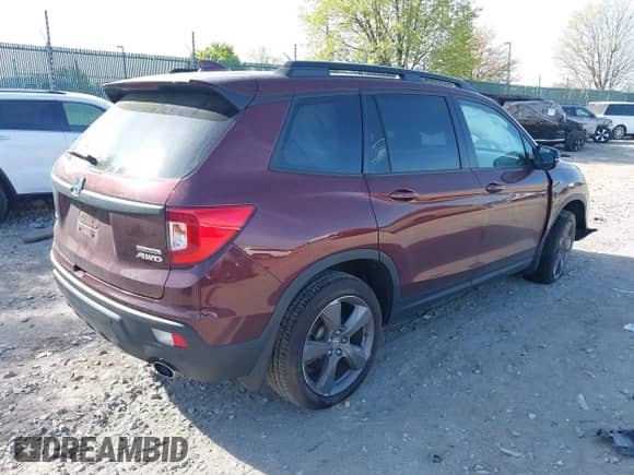 2021 Honda Passport Touring z VIN 5FNYF8H91MB022986, wystawiony jako IAAI lot #42077321 z przebiegiem 20 497 mil mil oraz . Historia ofert i sprzedaży dostępna na DreamBid. Obrazek 4.
