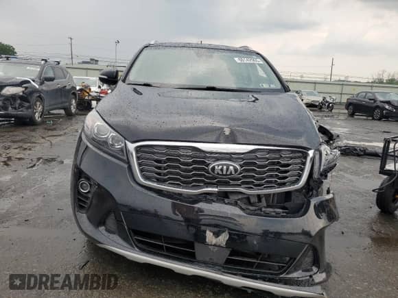 2020 Kia Sorento EX z VIN 5XYPH4A57LG710522, wystawiony jako Copart lot #60142965 z przebiegiem 94 776 mil mil oraz Szkoda całkowita • Salvage title. Historia ofert i sprzedaży dostępna na DreamBid. Obrazek 5.