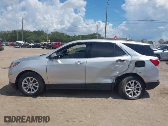 2020 Chevrolet Equinox LT with VIN 2GNAXJEV4L6191709, listed as a IAAI auction lot 43031606 with 148,713 mi miles and . Bid and sale history available at DreamBid. Image 14.