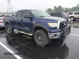 2012 Toyota Tundra z VIN 5TFRY5F15CX127772, wystawiony jako IAAI lot #42198720 z przebiegiem 145 422 mil mil oraz . Historia ofert i sprzedaży dostępna na DreamBid. Obrazek 1.
