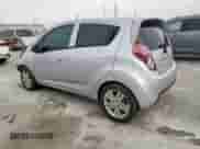2015 Chevrolet Spark LS with VIN KL8CA6S93FC799149, listed as a Copart auction lot 60737185 with 114,469 mi miles and Salvage title. Bid and sale history available at DreamBid. Image 2.