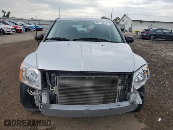 2009 Dodge Caliber SXT z VIN 1B3HB48AX9D181259, wystawiony jako Copart lot #80146215 z przebiegiem 94 695 mil mil oraz Szkoda całkowita • Salvage title. Historia ofert i sprzedaży dostępna na DreamBid. Obrazek 5.