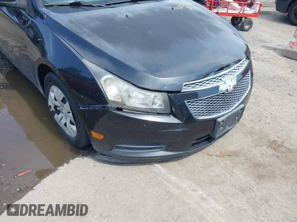 2014 Chevrolet Cruze LS with VIN 1G1PB5SH1E7130630, listed as a IAAI auction lot 42630728 with 142,717 mi miles and . Bid and sale history available at DreamBid. Image 6.