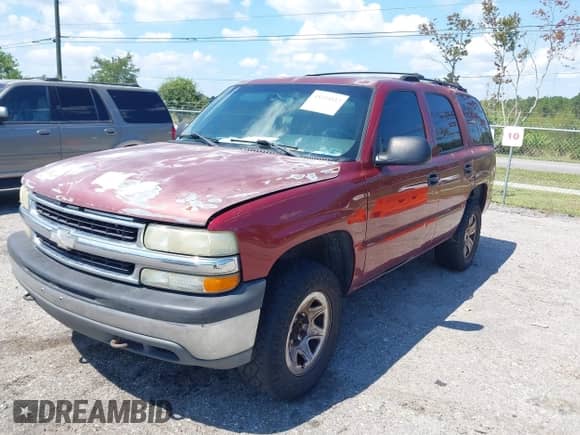 2003 Chevrolet Tahoe LT with VIN 1GNEK13Z63J228106, listed as a IAAI auction lot 43233532 with 257,615 mi miles and . Bid and sale history available at DreamBid. Image 2.