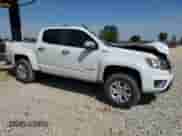 2016 Chevrolet Colorado 4WD LT с VIN 1GCPTCE13G1320488, выставлен на аукционе Copart как лот 53633815 с пробегом 129 283 миль миль и Списание • Salvage title. История ставок и продаж доступна на DreamBid. Изображение 4.