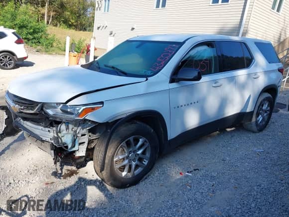 2020 Chevrolet Traverse LS with VIN 1GNERFKW6LJ113702, listed as a IAAI auction lot 43250391 with 73,072 mi miles and . Bid and sale history available at DreamBid. Image 2.