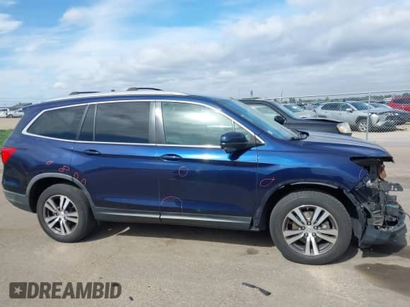 2016 Honda Pilot EX-L z VIN 5FNYF6H74GB037487, wystawiony jako IAAI lot #42282463 z przebiegiem 130 120 mil mil oraz . Historia ofert i sprzedaży dostępna na DreamBid. Obrazek 13.