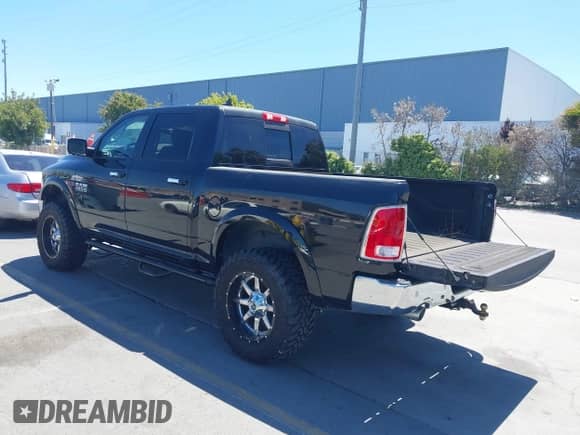 2018 Ram 1500 Laramie with VIN 1C6RR7NM5JS338590, listed as a IAAI auction lot 42922478 with 91,939 mi miles and . Bid and sale history available at DreamBid. Image 3.