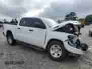 2024 Ram 1500 Tradesman with VIN 1C6RREGG7RN210034, listed as a Copart auction lot 59610625 with 14,443 mi miles and Salvage title. Bid and sale history available at DreamBid. Image 4.