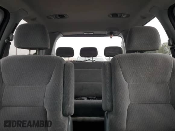 2004 Honda Odyssey LX with VIN 5FNRL18574B137609, listed as a Copart auction lot 68292805 with 172,873 mi miles and Salvage title. Bid and sale history available at DreamBid. Image 10.