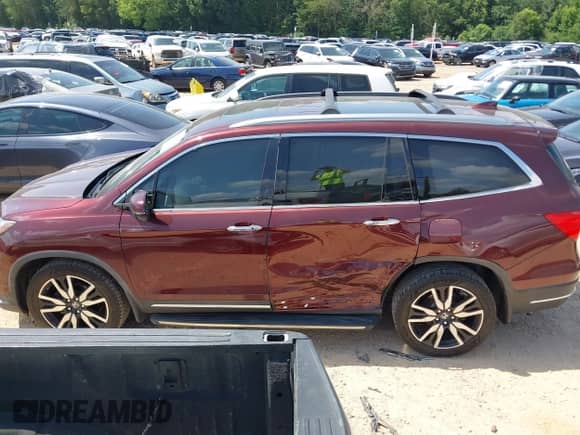 2020 Honda Pilot Elite z VIN 5FNYF6H08LB050871, wystawiony jako IAAI lot #42704675 z przebiegiem 77 095 mil mil oraz . Historia ofert i sprzedaży dostępna na DreamBid. Obrazek 14.