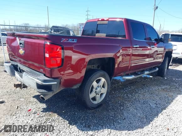 2016 Chevrolet Silverado 2500HD LTZ with VIN 1GC1KWEG1GF305909, listed as a IAAI auction lot 41709024 with 56,561 mi miles and . Bid and sale history available at DreamBid. Image 4.