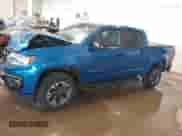 2021 Chevrolet Colorado 4WD Z71 z VIN 1GCGTDEN7M1141049, wystawiony jako IAAI lot #41223962 z przebiegiem 62 114 mil mil oraz . Historia ofert i sprzedaży dostępna na DreamBid. Obrazek 14.