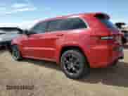 2014 Jeep Grand Cherokee SRT-8 z VIN 1C4RJFDJ4EC202579, wystawiony jako Copart lot #62811605 z przebiegiem 83 024 mil mil oraz Szkoda całkowita • Salvage title. Historia ofert i sprzedaży dostępna na DreamBid. Obrazek 2.