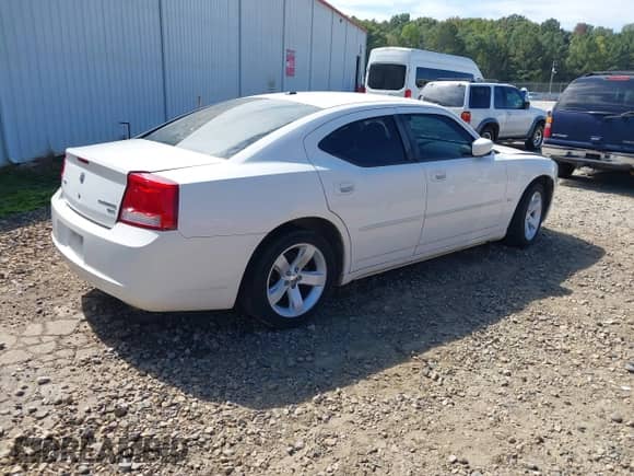 2010 Dodge Charger SXT с VIN 2B3CA3CV5AH191836, выставлен на аукционе IAAI как лот 43359402 с пробегом 264 507 миль миль и . История ставок и продаж доступна на DreamBid. Изображение 4.