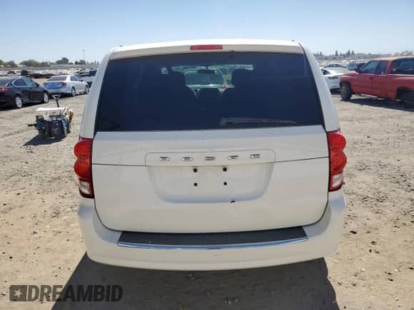 2013 Dodge Grand Caravan SE z VIN 2C4RDGBG5DR516901, wystawiony jako Copart lot #81692035 z przebiegiem 230 679 mil mil oraz Czysty tytuł • Clean title. Historia ofert i sprzedaży dostępna na DreamBid. Obrazek 6.