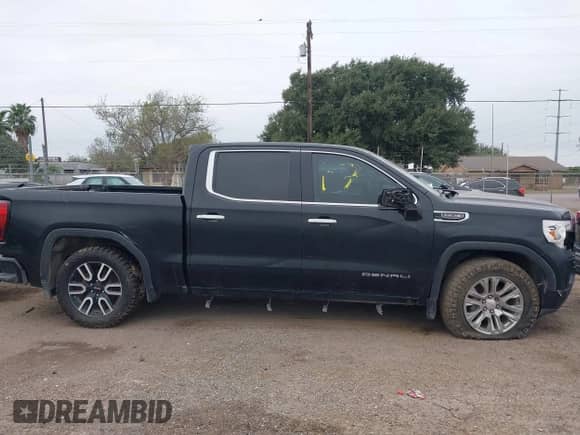 2020 GMC Sierra 1500 Denali z VIN 3GTU9FED7LG164867, wystawiony jako IAAI lot #41073863 z przebiegiem 87 585 mil mil oraz . Historia ofert i sprzedaży dostępna na DreamBid. Obrazek 13.
