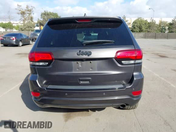 2018 Jeep Grand Cherokee Laredo E with VIN 1C4RJEAG9JC125219, listed as a IAAI auction lot 43438483 with 103,670 mi miles and . Bid and sale history available at DreamBid. Image 16.
