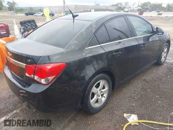 2013 Chevrolet Cruze 1LT with VIN 1G1PC5SBXD7109038, listed as a IAAI auction lot 43413290 with 105,515 mi miles and . Bid and sale history available at DreamBid. Image 4.