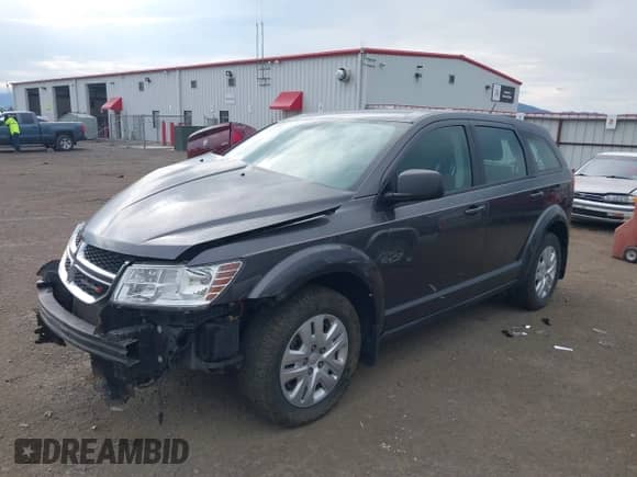 2015 Dodge Journey American Value z VIN 3C4PDCAB9FT620121, wystawiony jako IAAI lot #43000706 z przebiegiem 80 120 mil mil oraz . Historia ofert i sprzedaży dostępna na DreamBid. Obrazek 2.