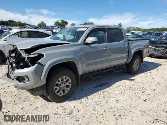 2019 Toyota Tacoma TRD Off Road z VIN 3TMCZ5ANXKM250954, wystawiony jako Copart lot #65703125 z przebiegiem 53 473 mil mil oraz Szkoda całkowita • Salvage title. Historia ofert i sprzedaży dostępna na DreamBid. Obrazek 1.